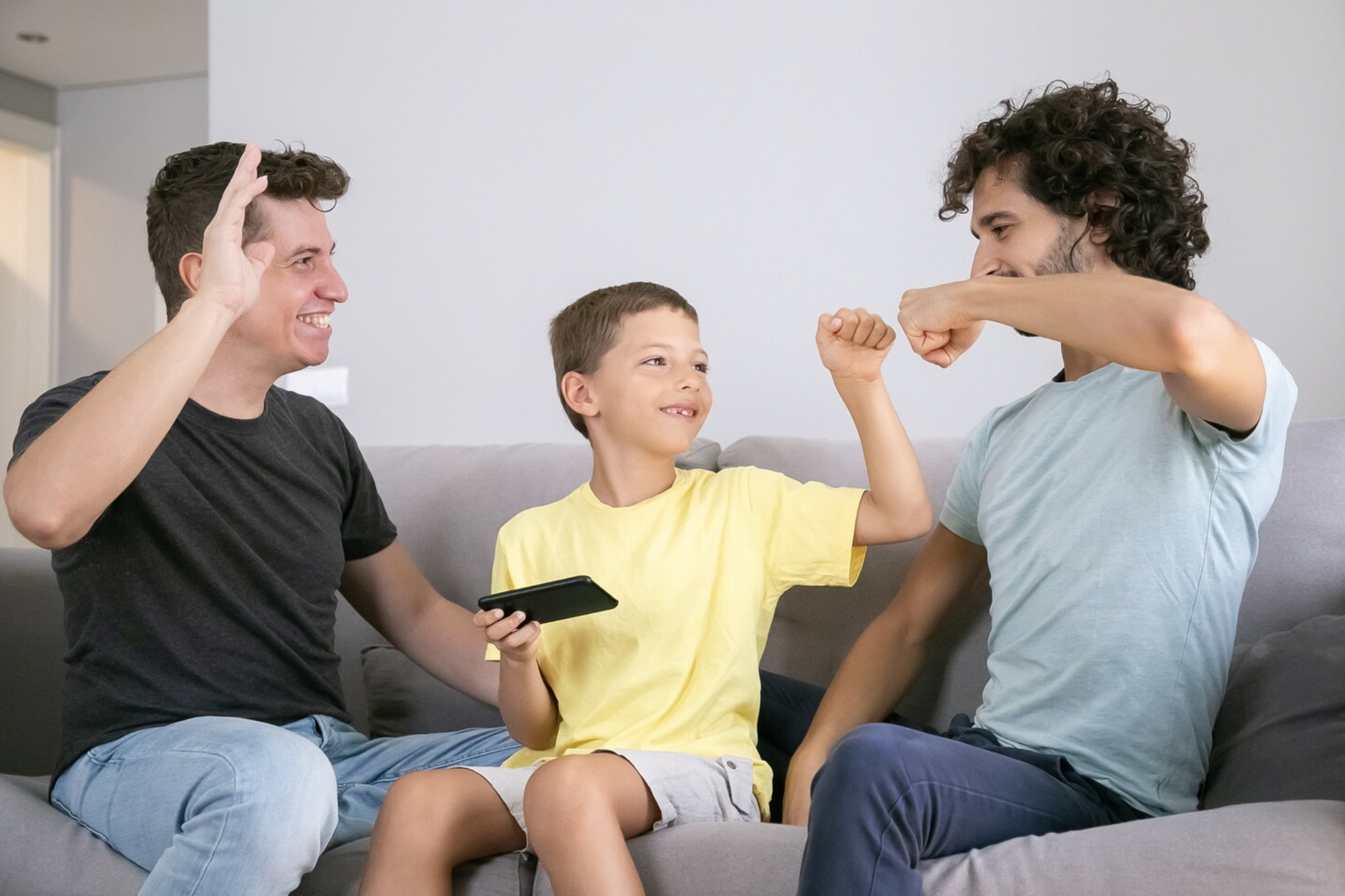 LGBTQ intended parents celebrating together