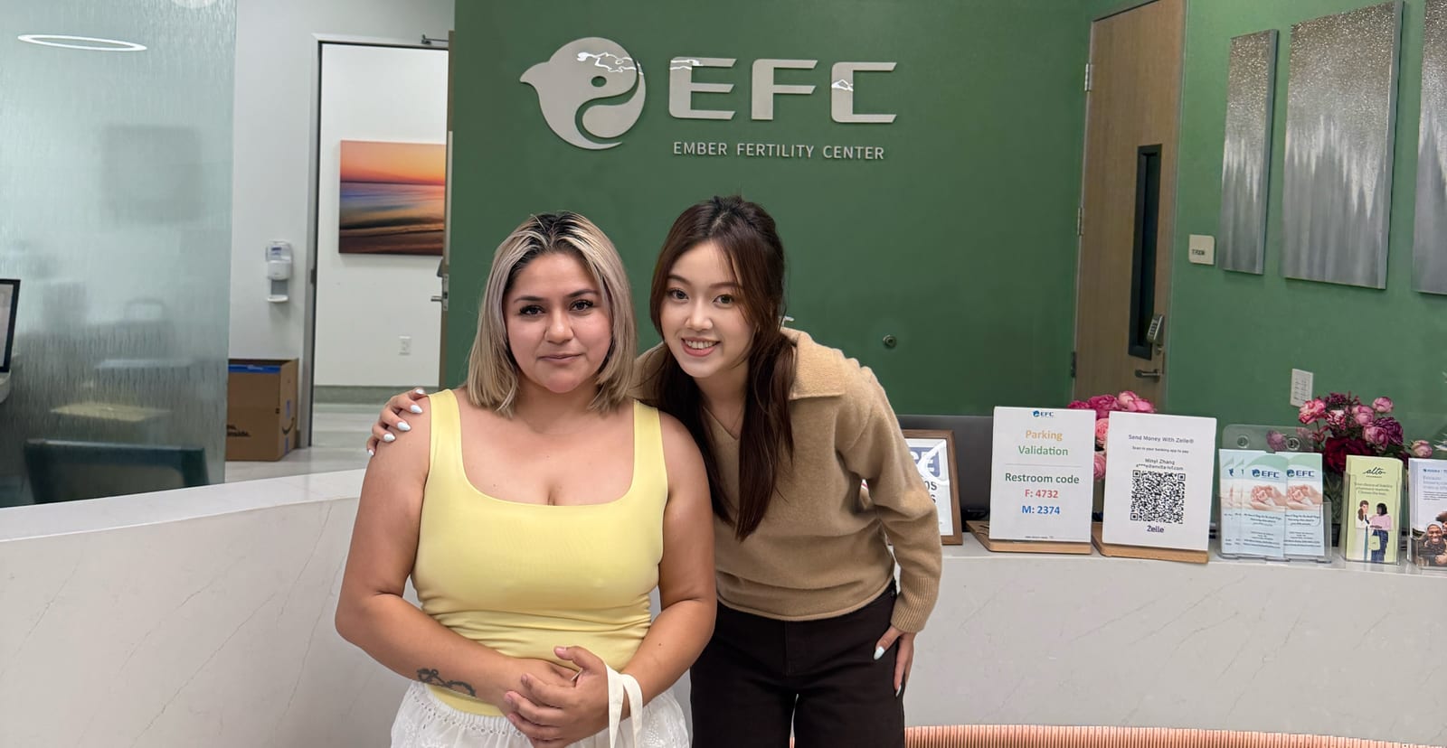 Yunda supporting a client at a California fertility clinic
