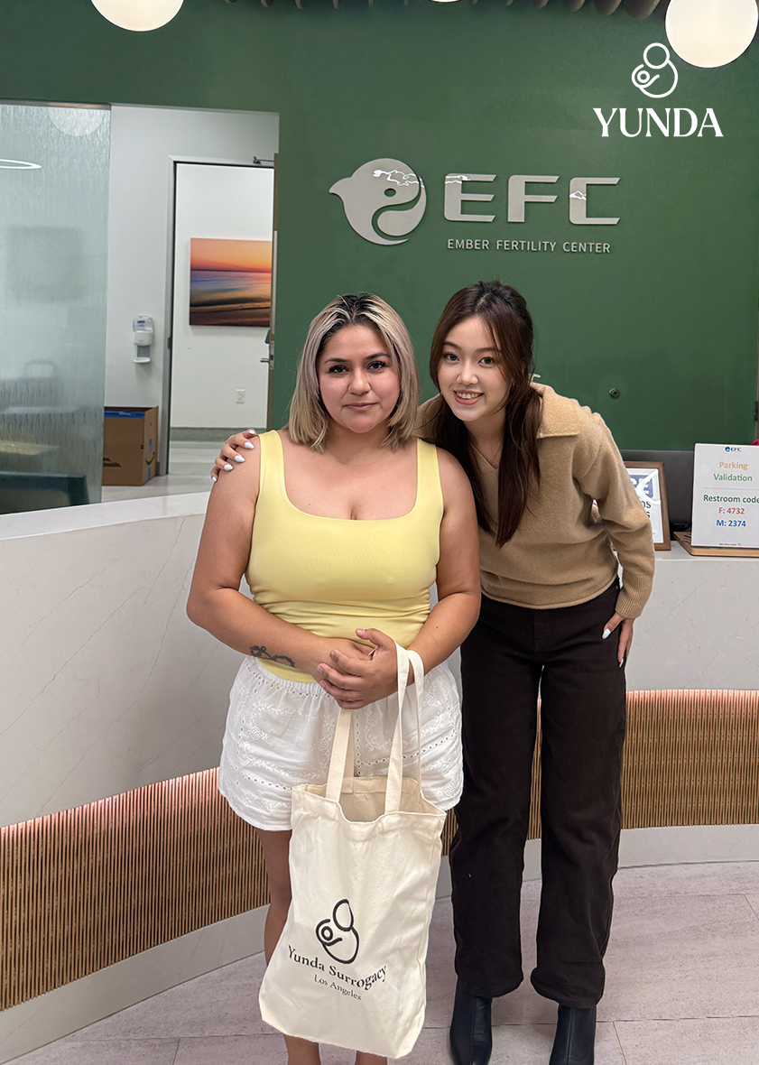 Yunda team supporting a surrogate at Ember Fertility Center