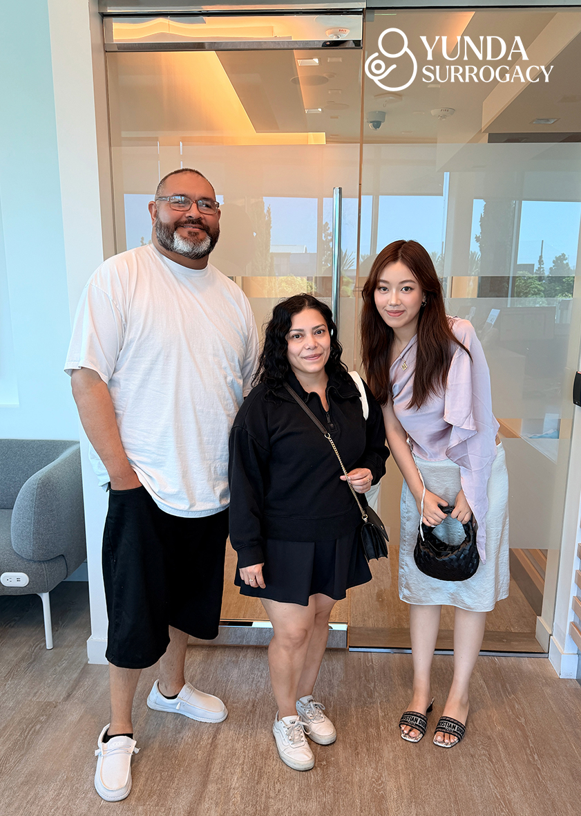 Yunda team supporting a surrogate during her journey
